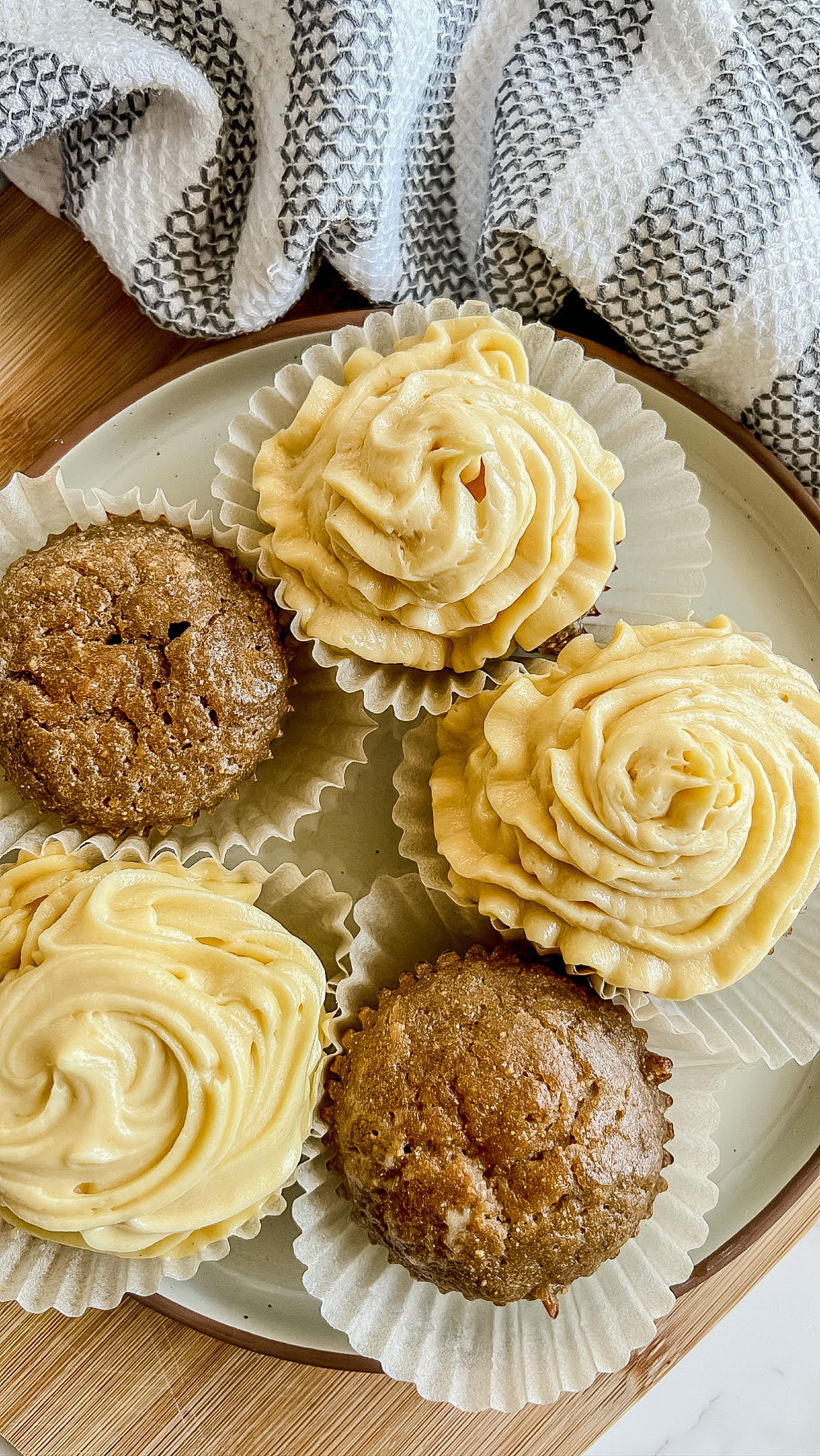 cupcakes with raw buttercream frosting